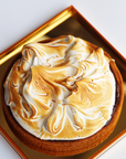 Meringue Tart in Golden Lucite Dome