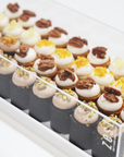 Assorted Mini Cakes in Lucite Tray