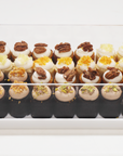 Assorted Mini Cakes in Lucite Tray