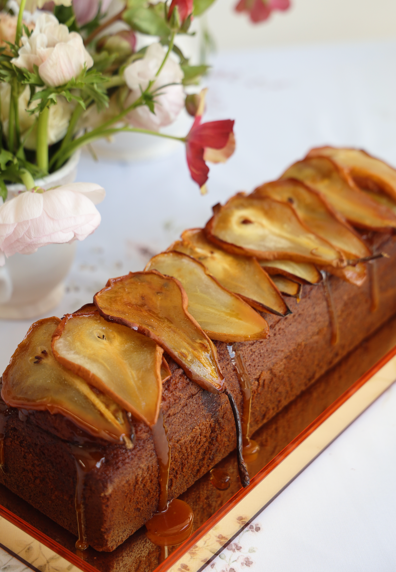 Caramelized Honey Pear Log Cake in Golden Lucite Dome