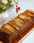 Caramelized Honey Pear Log Cake in Golden Lucite Dome