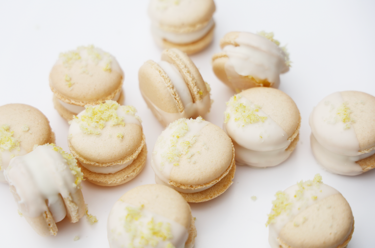 Fresh Lemon Zest White Chocolate Dipped Macarons- KFP – ZestBakeshop